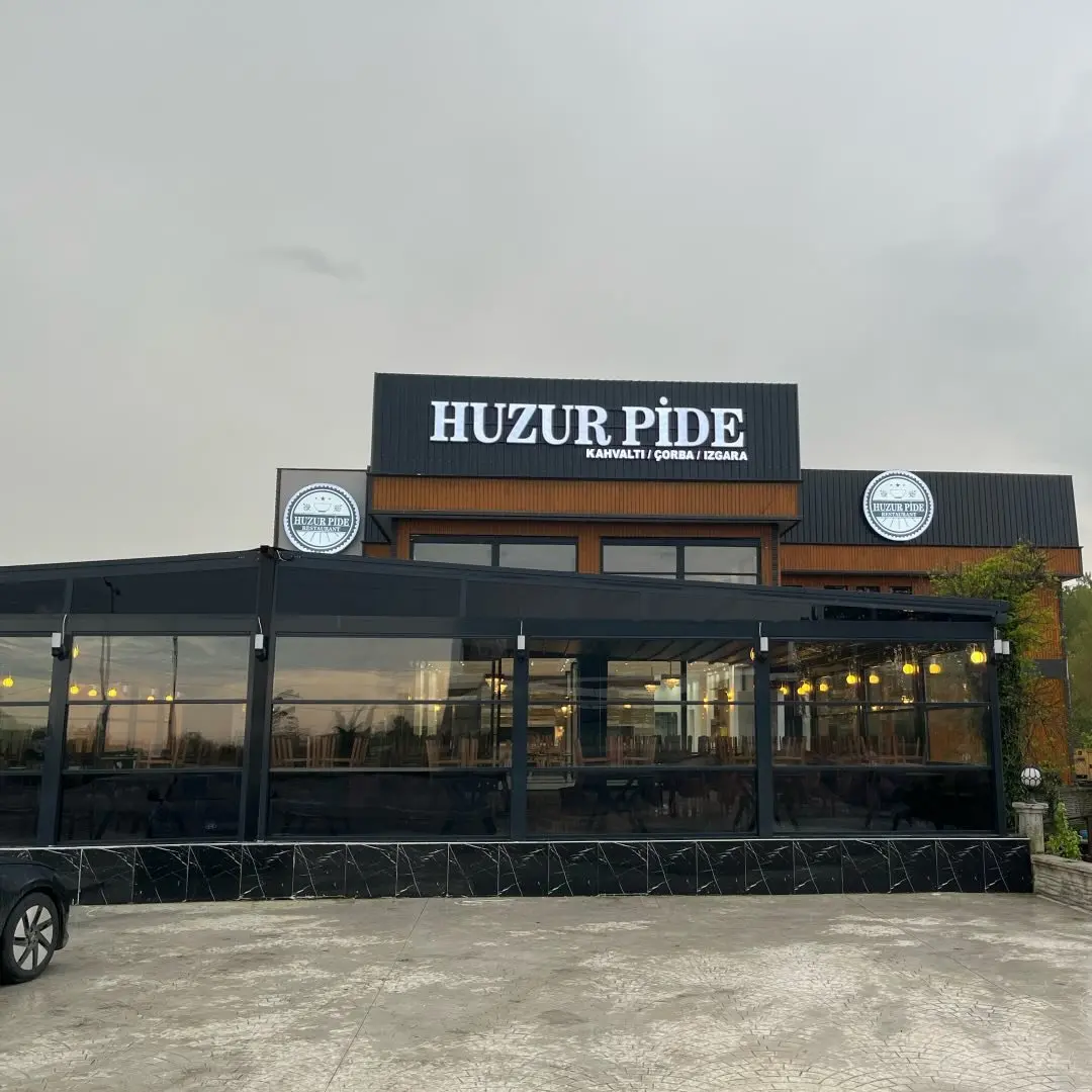 The Huzur Pide sign and its glazed terrace